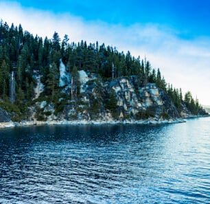 Alaska glacier cruise with snow-capped mountains and icy waters