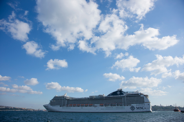 Romantic couple cruise trip with private balconies and sunset dining.